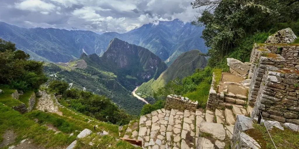 Sunrise over Machu Picchu seen from the Sun Gate at the end of the classic Inca Trail route