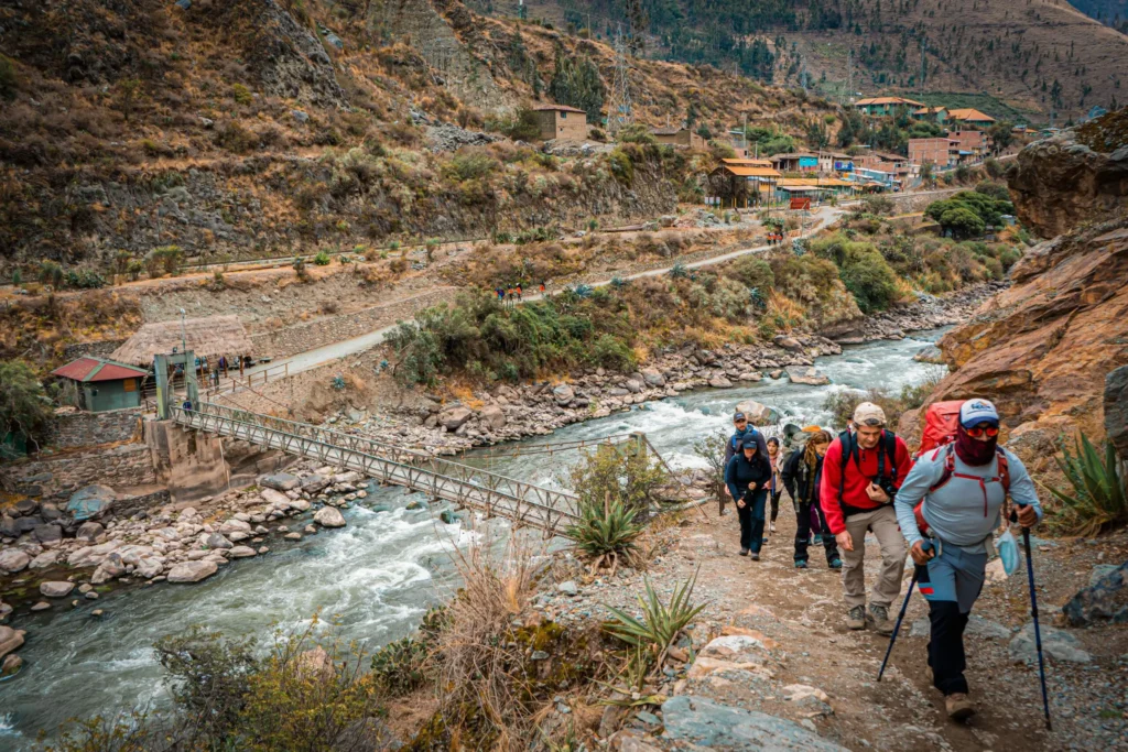 Inca Trail Machu Picchu day one trekkers walking along the Urubamba River valley trailhead